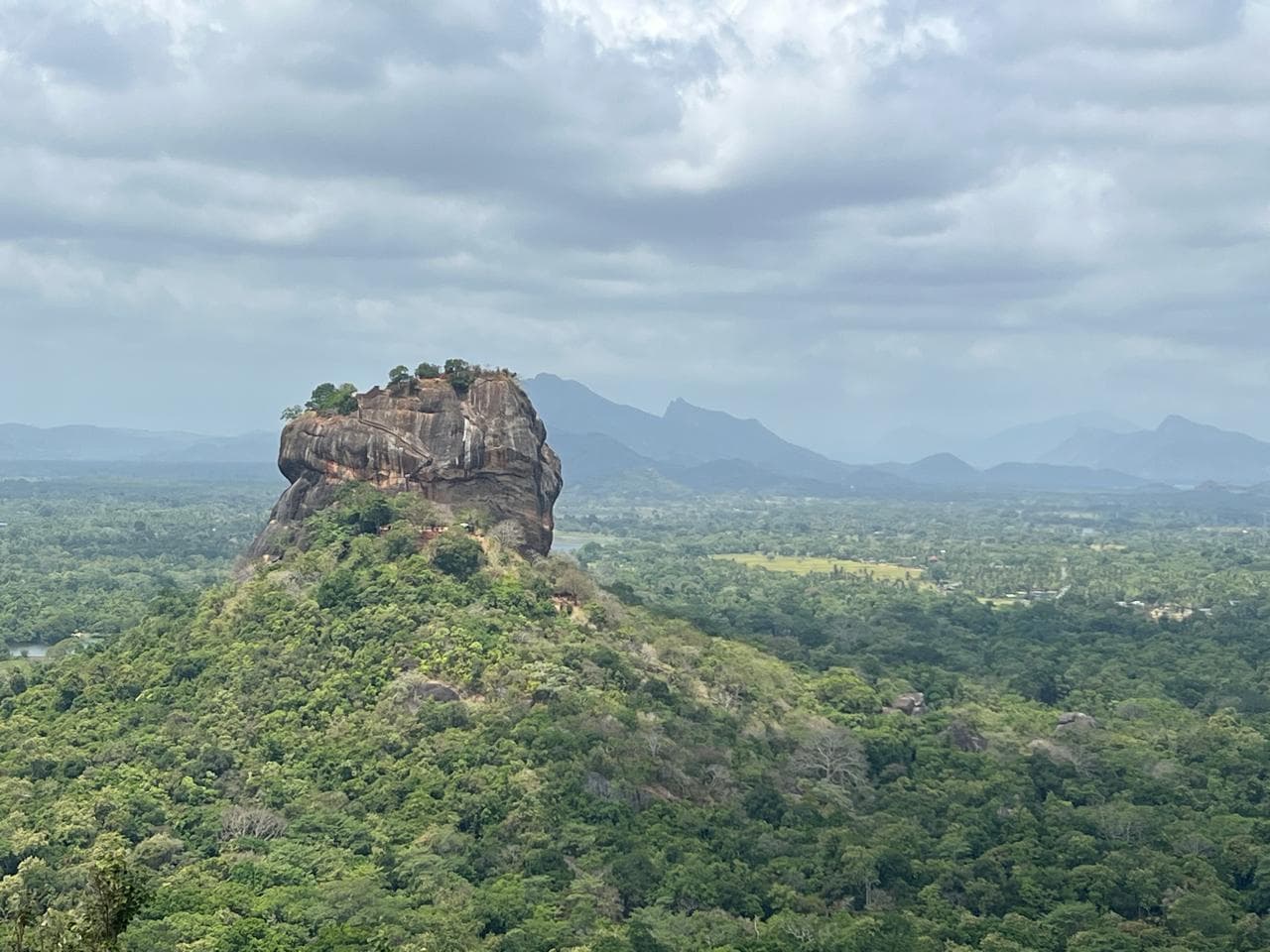 Sigiriya rock rising above the plains