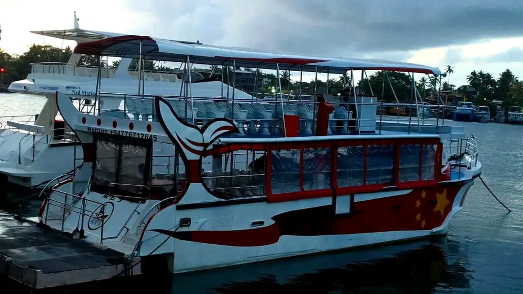 Tour boat moored on the water